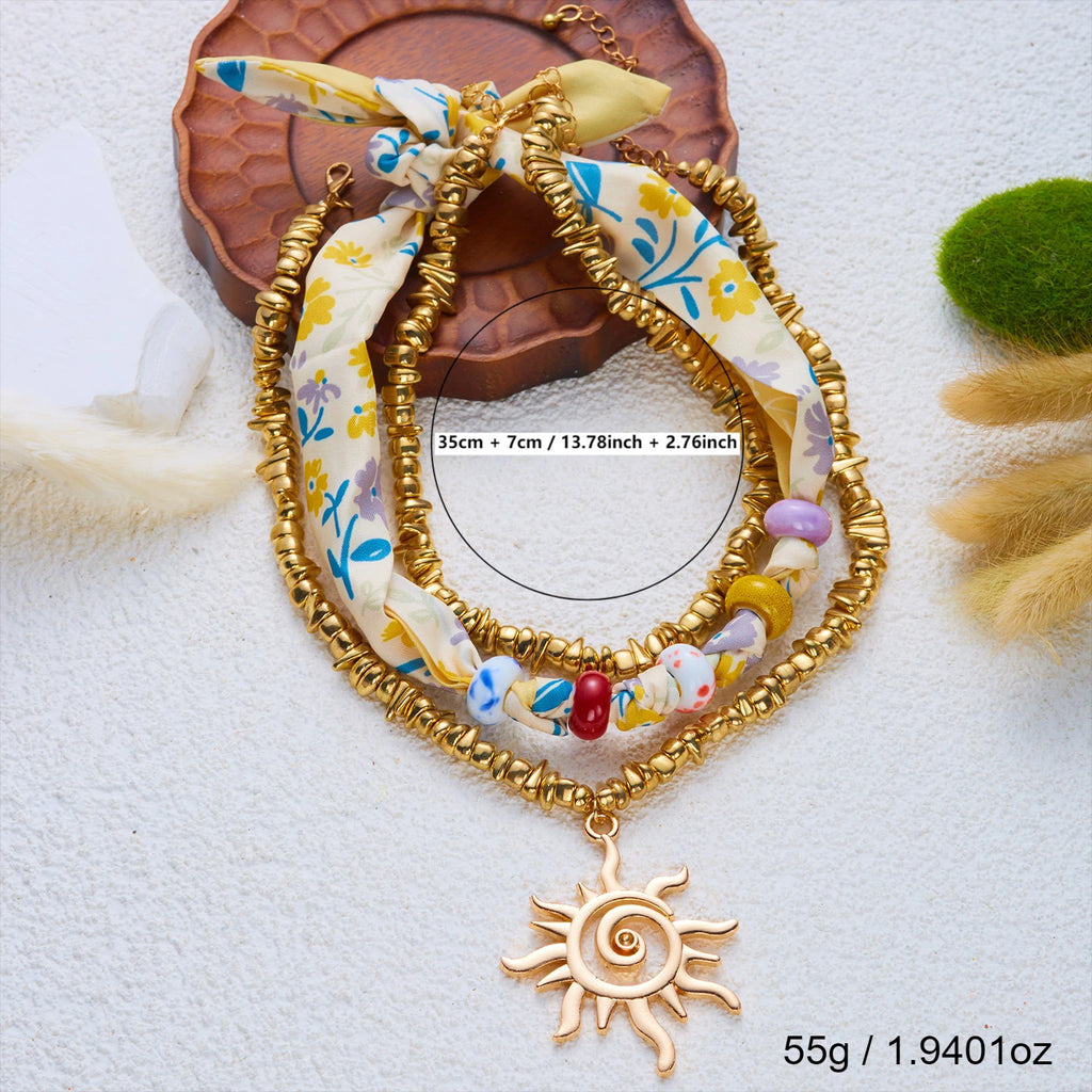 collana bandana con ciondoli