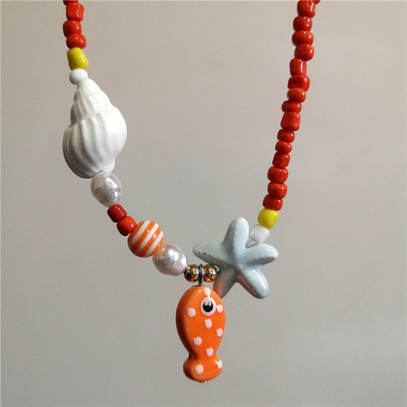 Collana girocollo con perline con ciondolo stella marina in ceramica colorata estiva per le donne Accessori per gioielli Boho romantici da spiaggia all'ingrosso
