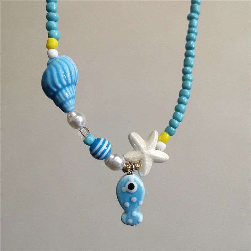 Collana girocollo con perline con ciondolo stella marina in ceramica colorata estiva per le donne Accessori per gioielli Boho romantici da spiaggia all'ingrosso