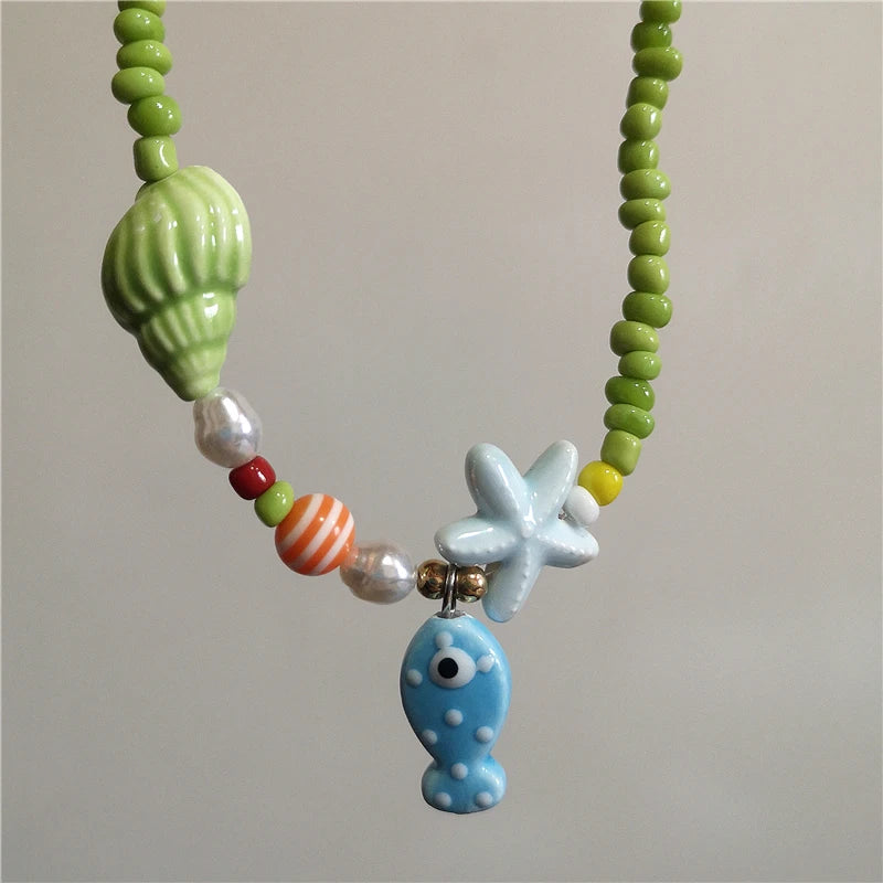 Collana girocollo con perline con ciondolo stella marina in ceramica colorata estiva per le donne Accessori per gioielli Boho romantici da spiaggia all'ingrosso