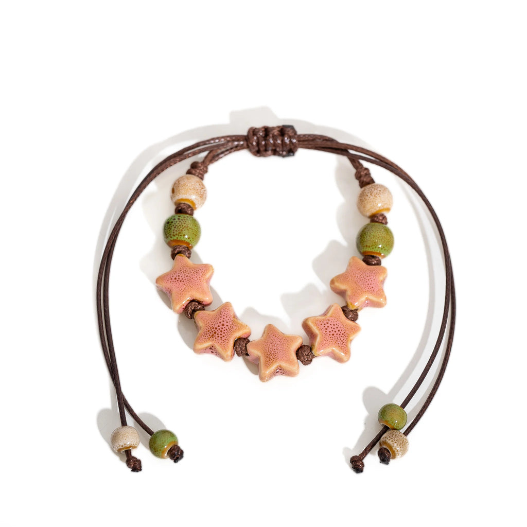 Bracciale regolabile fatto a mano con pentagramma Perline in ceramica Cavo di cera Gioielli da donna Regalo originale Accessorio per coppia