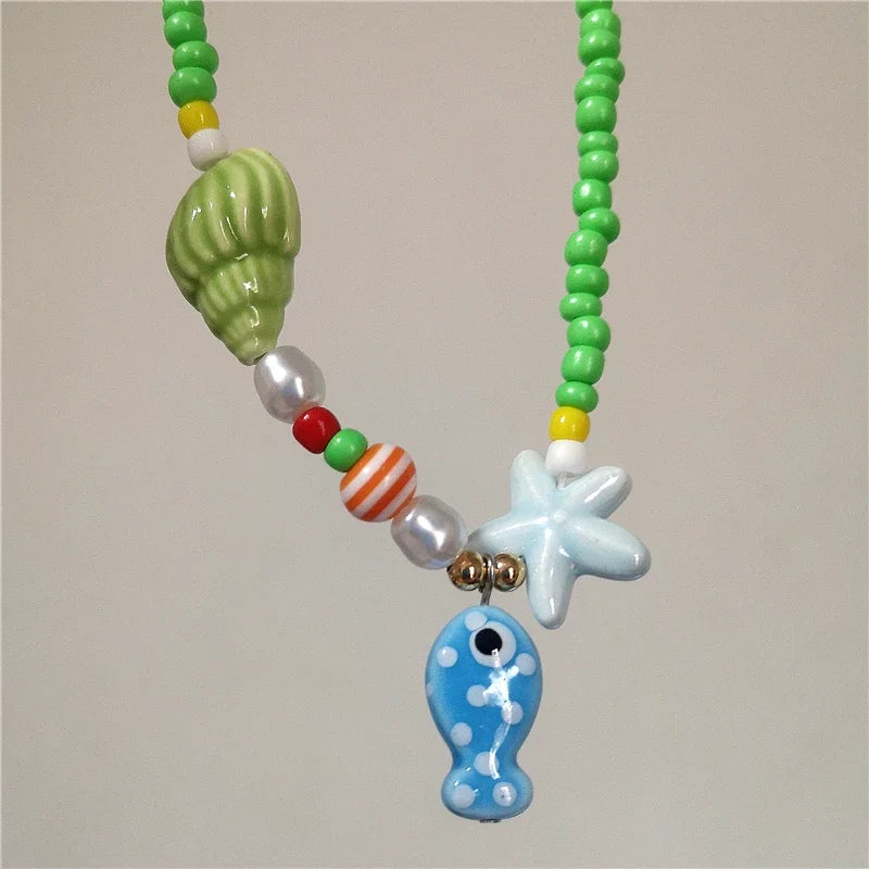 Collana girocollo con perline con ciondolo stella marina in ceramica colorata estiva per le donne Accessori per gioielli Boho romantici da spiaggia all'ingrosso