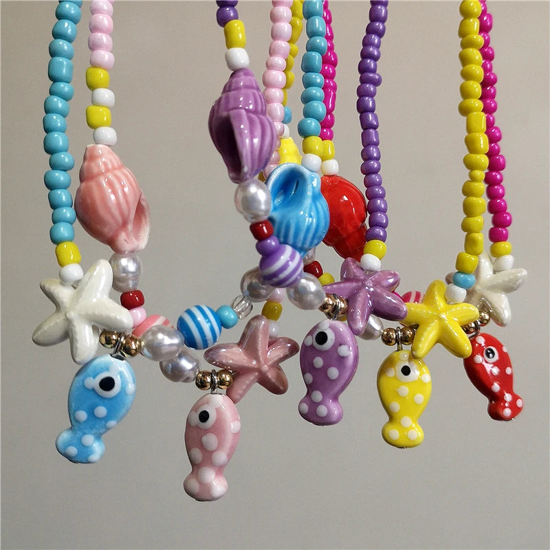 Collana girocollo con perline con ciondolo stella marina in ceramica colorata estiva per le donne Accessori per gioielli Boho romantici da spiaggia all'ingrosso