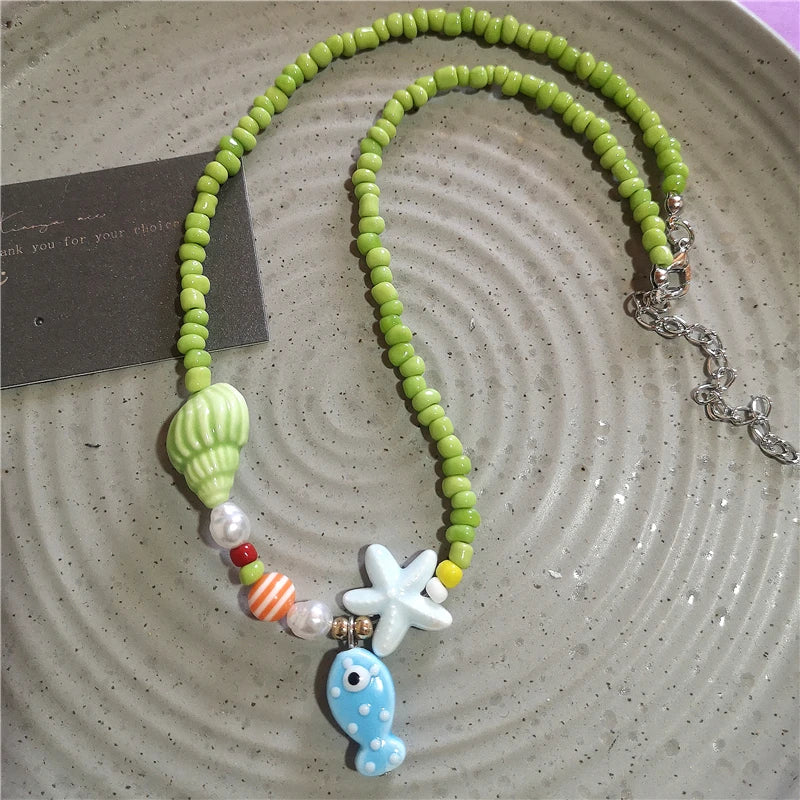 Collana girocollo con perline con ciondolo stella marina in ceramica colorata estiva per le donne Accessori per gioielli Boho romantici da spiaggia all'ingrosso
