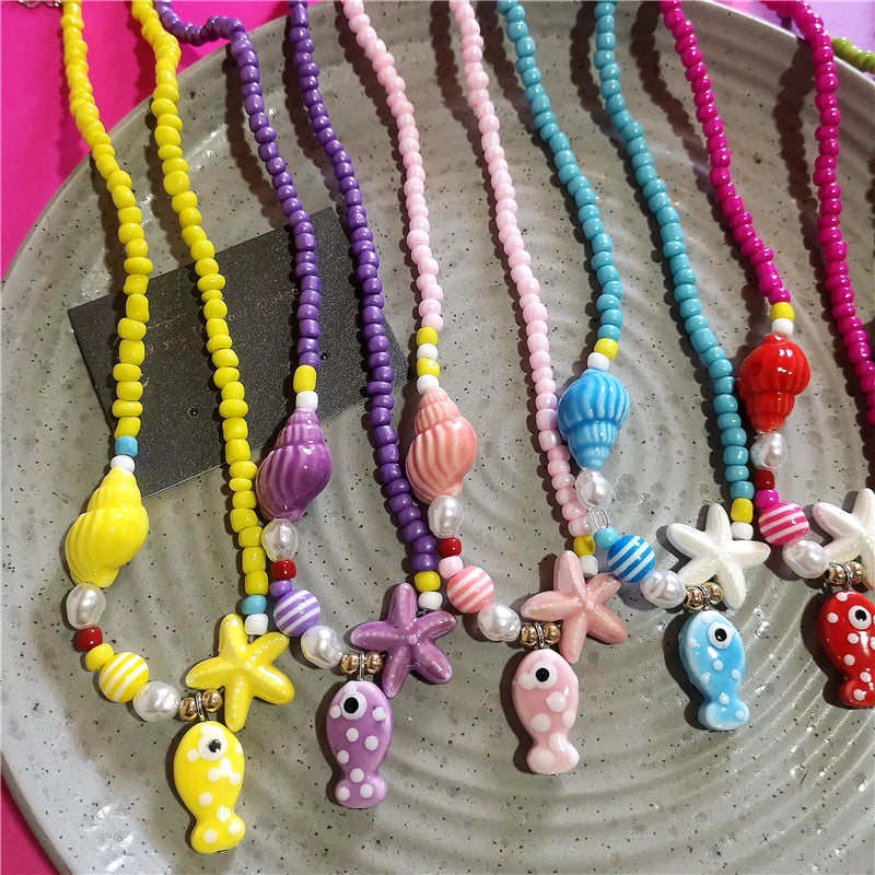 Collana girocollo con perline con ciondolo stella marina in ceramica colorata estiva per le donne Accessori per gioielli Boho romantici da spiaggia all'ingrosso