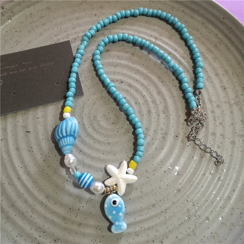Collana girocollo con perline con ciondolo stella marina in ceramica colorata estiva per le donne Accessori per gioielli Boho romantici da spiaggia all'ingrosso