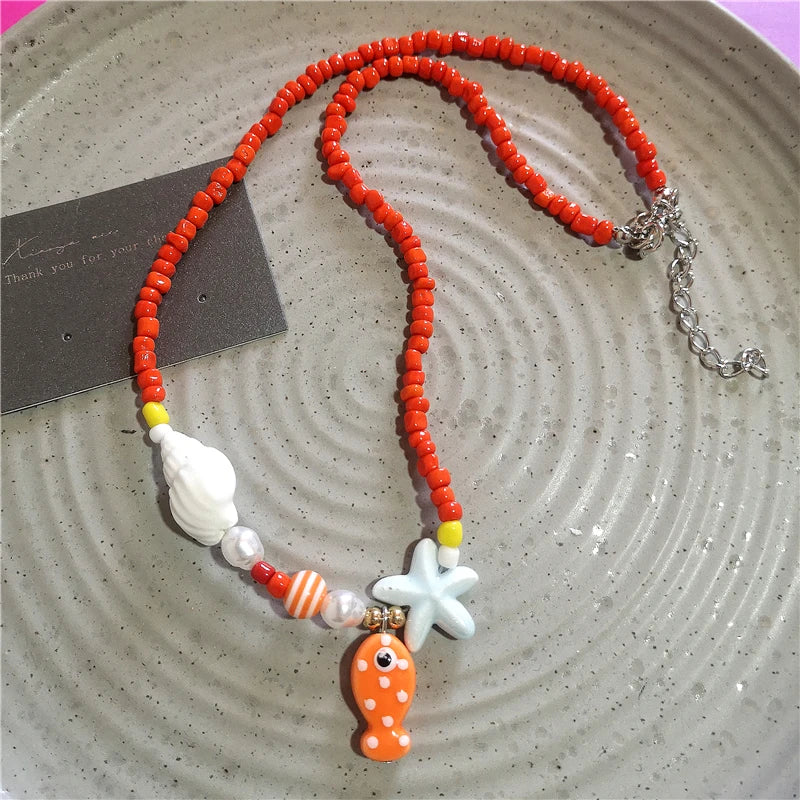 Collana girocollo con perline con ciondolo stella marina in ceramica colorata estiva per le donne Accessori per gioielli Boho romantici da spiaggia all'ingrosso