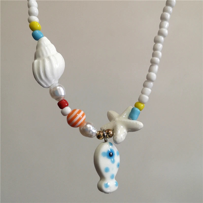 Collana girocollo con perline con ciondolo stella marina in ceramica colorata estiva per le donne Accessori per gioielli Boho romantici da spiaggia all'ingrosso