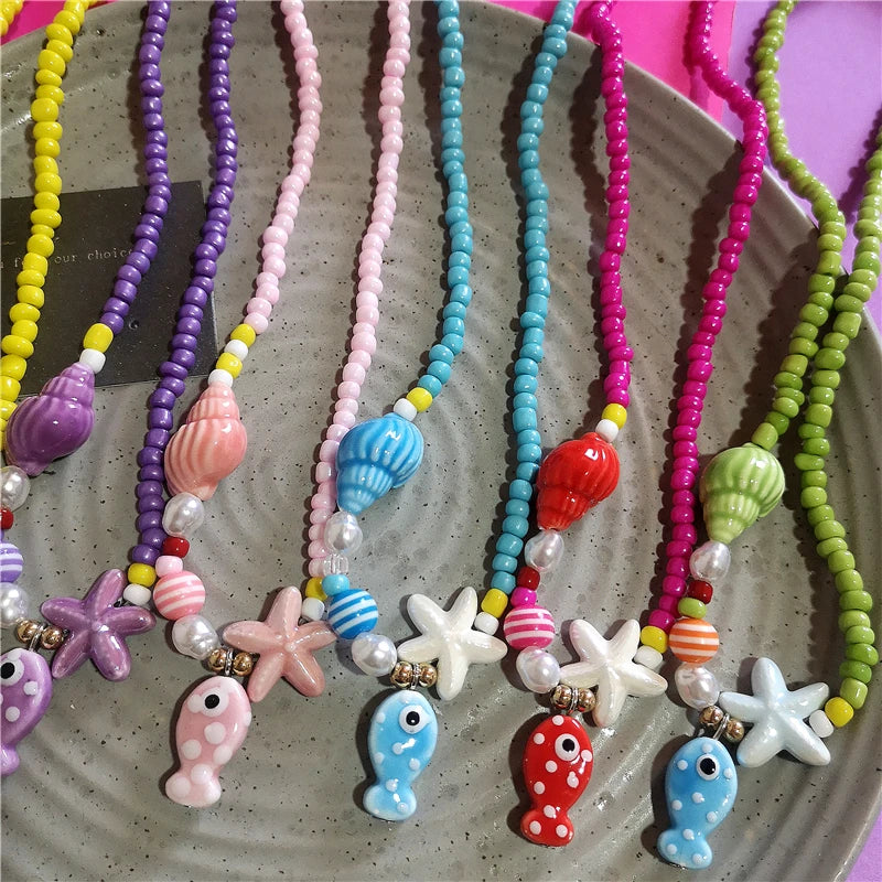 Collana girocollo con perline con ciondolo stella marina in ceramica colorata estiva per le donne Accessori per gioielli Boho romantici da spiaggia all'ingrosso