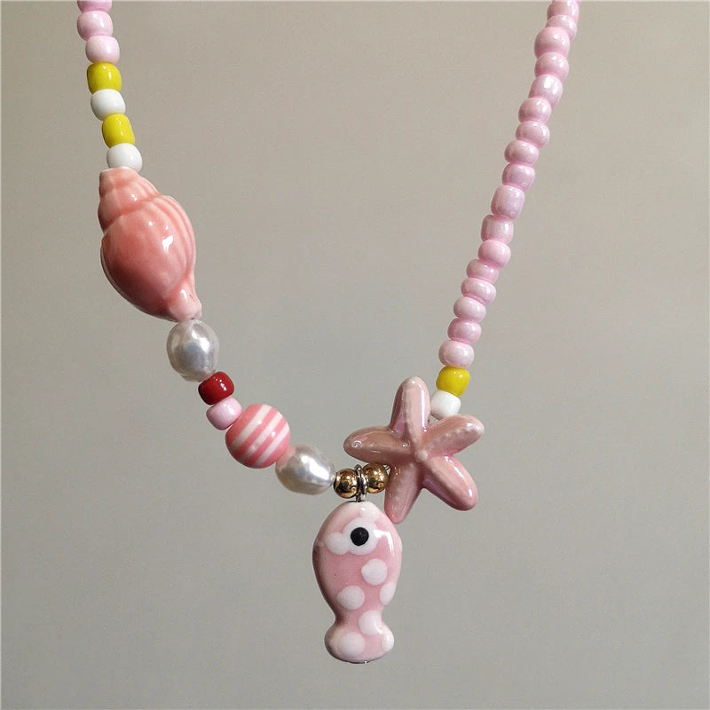 Collana girocollo con perline con ciondolo stella marina in ceramica colorata estiva per le donne Accessori per gioielli Boho romantici da spiaggia all'ingrosso