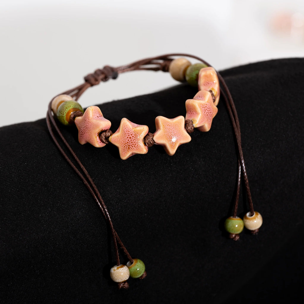 Bracciale regolabile fatto a mano con pentagramma Perline in ceramica Cavo di cera Gioielli da donna Regalo originale Accessorio per coppia