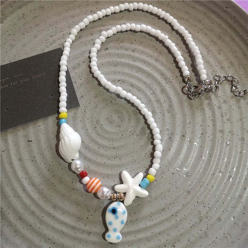 Collana girocollo con perline con ciondolo stella marina in ceramica colorata estiva per le donne Accessori per gioielli Boho romantici da spiaggia all'ingrosso