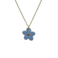Margherita | Handcrafted light blue floral ceramic necklace with golden detail - Glow