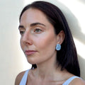 Perla | Handcrafted pearl light blue ceramic stud earrings - Glow