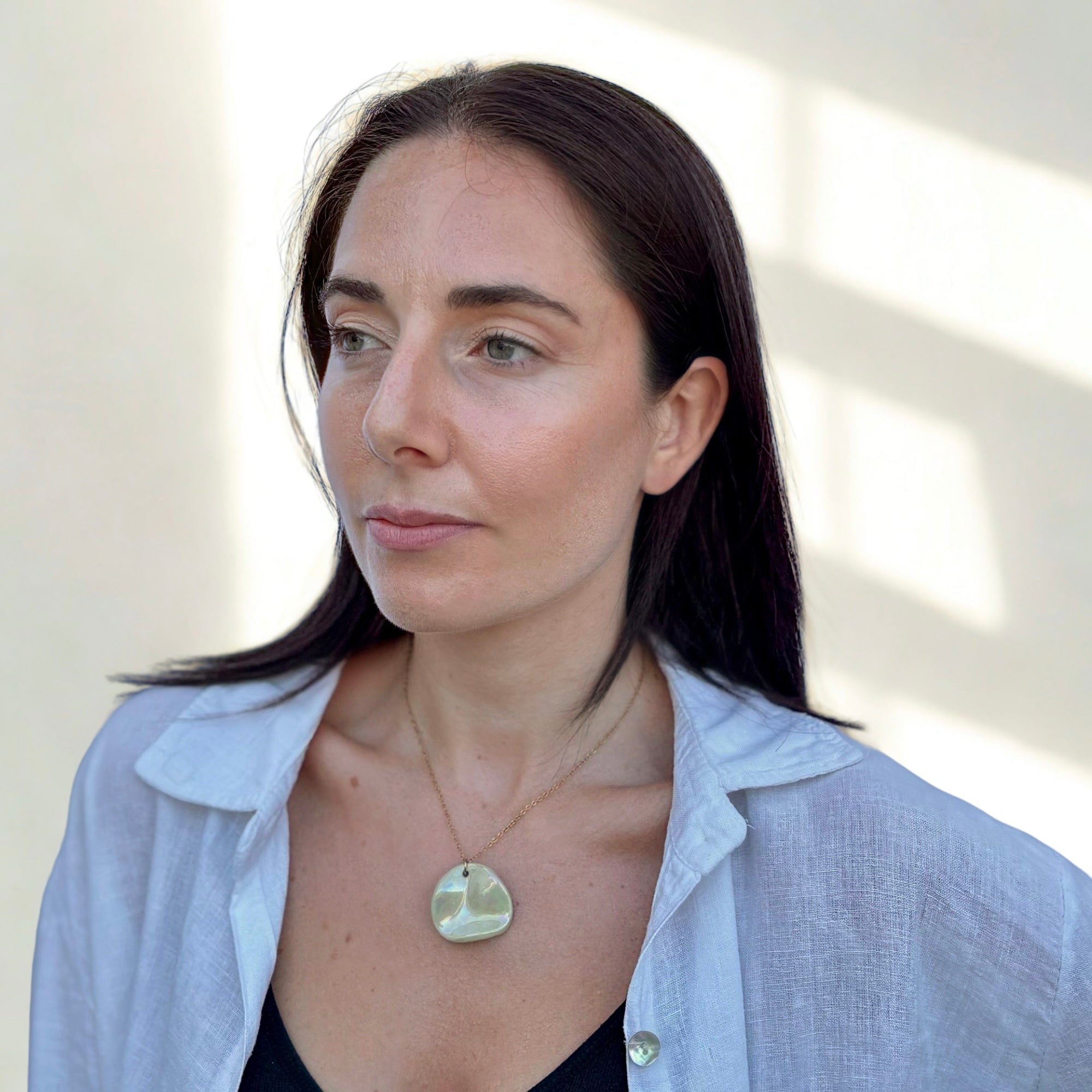 Perla | Handcrafted pearl sage - green ceramic necklace - Glow