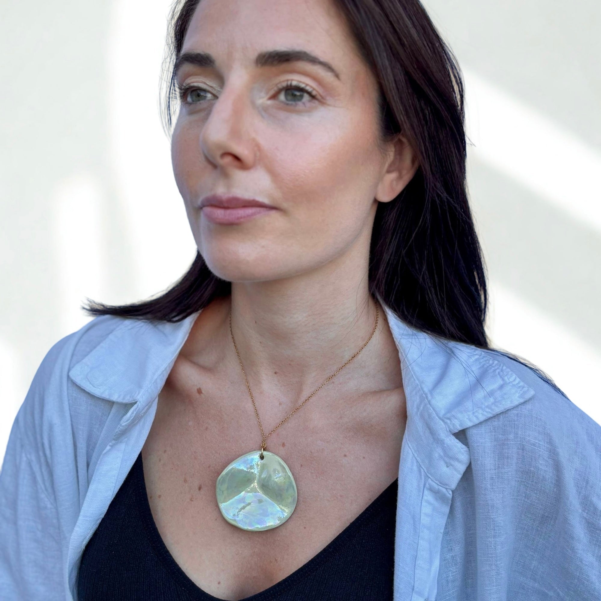 Perla | Handcrafted pearl sage - green ceramic necklace - Glow